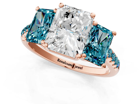 Rose gold Three-Stone Radiant Cut Diamond Ring with Round with Blue Topaz side stone Pavé Band and Prong Setting_1