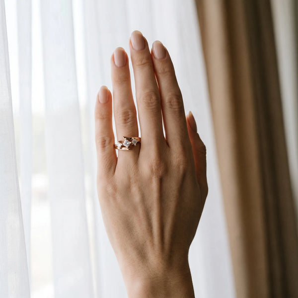 Rose gold Three-Stone Radiant Cut Tension Band Ring with Four-Prong Setting