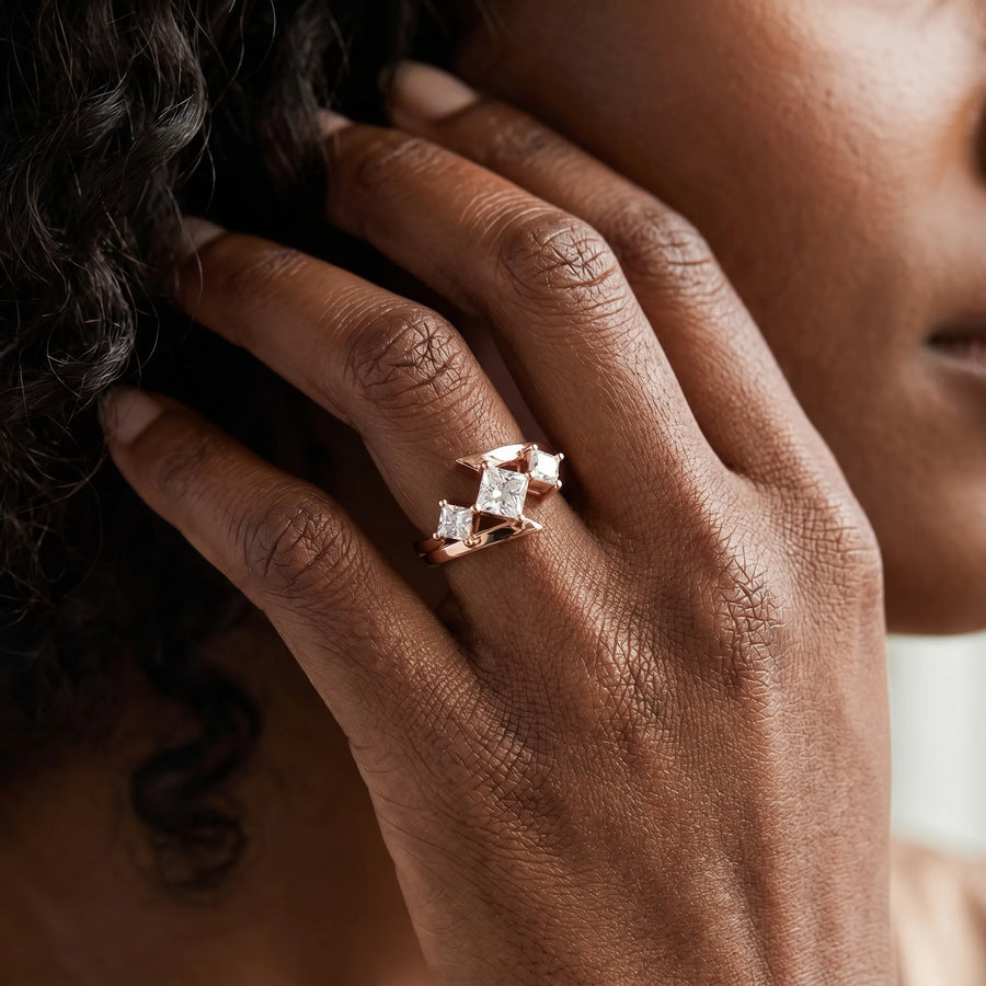 Rose gold Three-Stone Radiant Cut Tension Band Ring with Four-Prong Setting