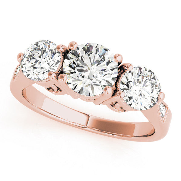 Rose gold Three-Stone Cushion Diamond Engagement Ring with Prong Setting on a Classic Band