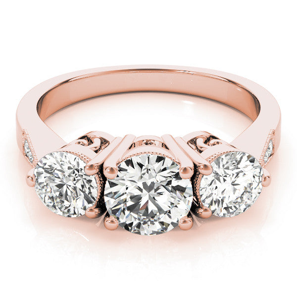 Rose gold Three-Stone Cushion Diamond Engagement Ring with Prong Setting on a Classic Band