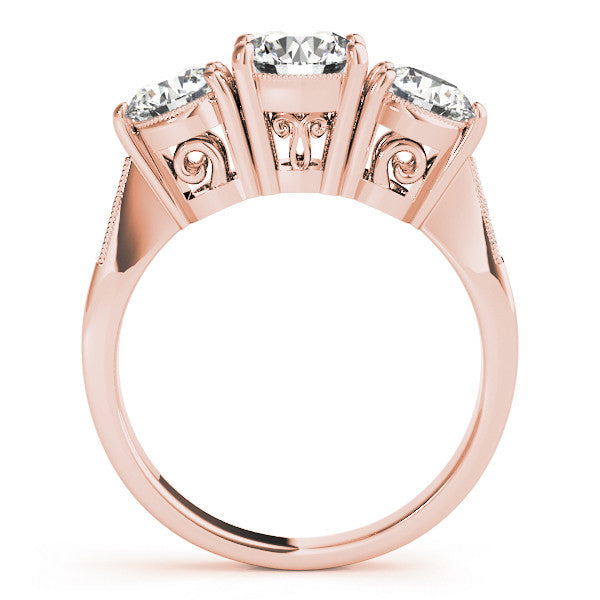 Rose gold Three-Stone Radiant Diamond Engagement Ring with Prong Setting on a Classic Band