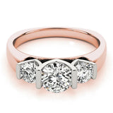 Rose gold Three-Stone Round Brilliant Diamond Ring with Channel Setting and White Gold Band 1