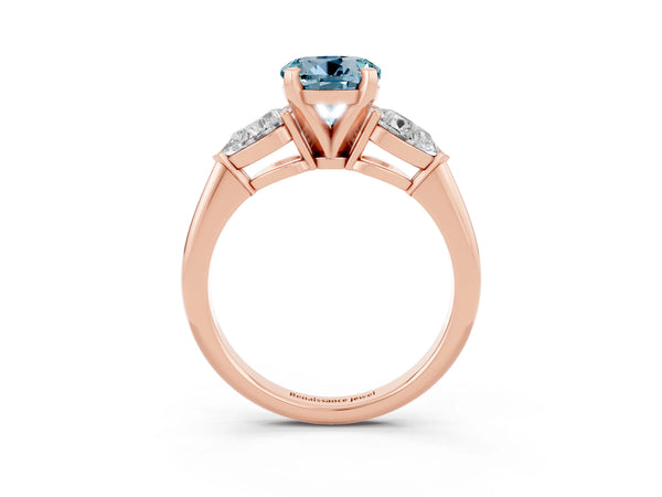 Rose gold Three-Stone Round Cut Aquamarine Ring with Pear Side Stones and Four-Prong Setting