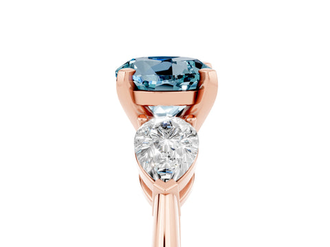 Rose gold Three-Stone Round Cut Aquamarine Ring with Pear Side Stones and Four-Prong Setting_5