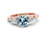Rose gold Three-Stone Round Cut Aquamarine Ring with Pear  Side Stones in Four-Prong Setting_12