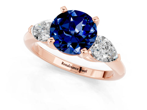 Rose gold Three-Stone Round Cut Blue Sapphire Ring with Pear Side Stones and Four-Prong Setting_1