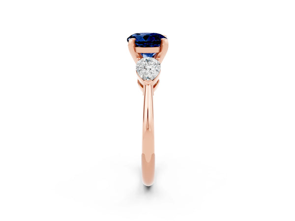 Rose gold Three-Stone Round Cut Blue Sapphire Ring with Pear Side Stones and Four-Prong Setting