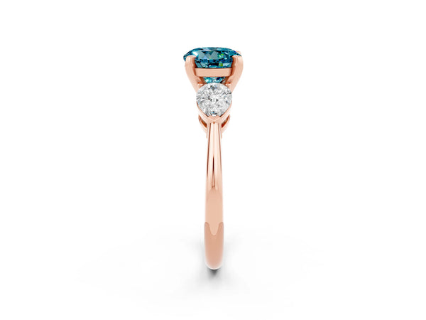 Rose gold Three-Stone Round Cut Blue Topaz Ring with Pear Side Stones and Four-Prong Setting