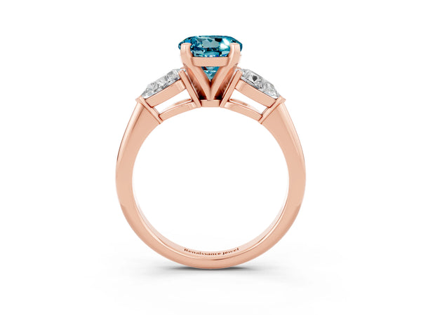 Rose gold Three-Stone Round Cut Blue Topaz Ring with Pear Side Stones and Four-Prong Setting
