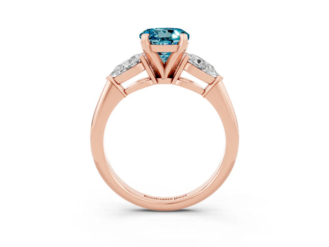 Rose gold Three-Stone Round Cut Blue Topaz Ring with Pear Side Stones and Four-Prong Setting_3