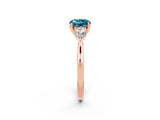 Rose gold Three-Stone Round Cut Blue Topaz Ring with Pear  Side Stones in Four-Prong Setting_14
