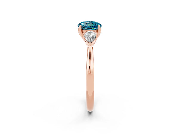 Rose gold Three-Stone Round Cut Blue Topaz Ring with Pear  Side Stones in Four-Prong Setting