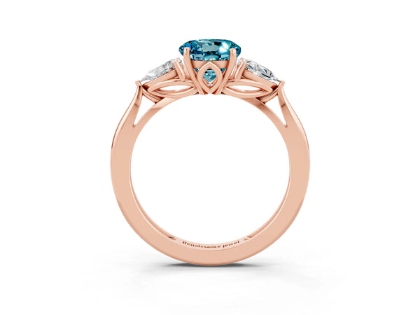 Rose gold Three-Stone Round Cut Blue Topaz Ring with Pear  Side Stones in Four-Prong Setting