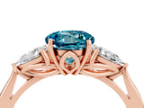 Rose gold Three-Stone Round Cut Blue Topaz Ring with Pear  Side Stones in Four-Prong Setting_16
