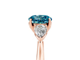 Rose gold Three-Stone Round Cut Blue Topaz Ring with Pear  Side Stones in Four-Prong Setting_17