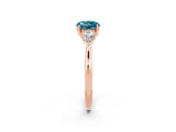 Rose gold Three-Stone Round Cut Blue Topaz Ring with Pear  Side Stones in Four-Prong Setting_38