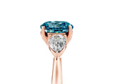 Rose gold Three-Stone Round Cut Blue Topaz Ring with Pear  Side Stones in Four-Prong Setting_41