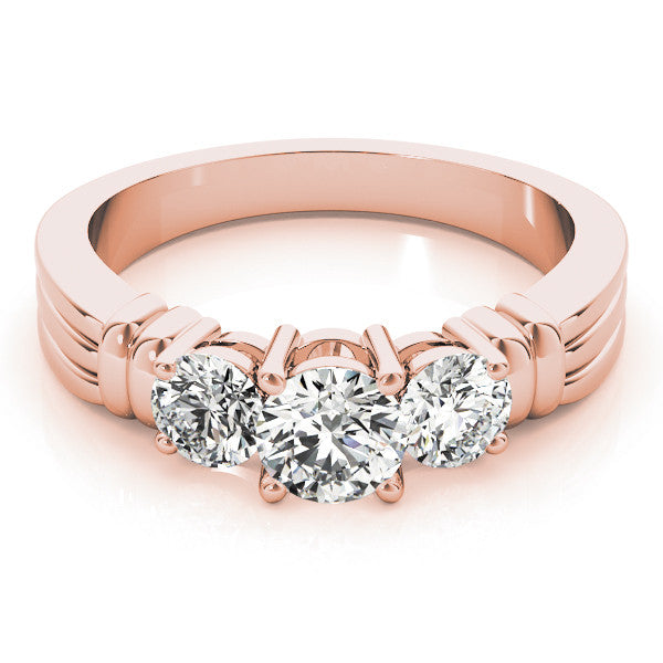 Rose gold Three-Stone Round Cut Channel Set Diamond Ring with Four-Prong Setting 1