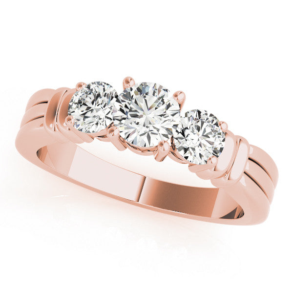 Rose gold Three-Stone Round Cut Channel Set Diamond Ring with Four-Prong Setting
