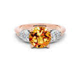 Rose gold Three-Stone Round Cut Citrine Ring with Pear Side Stones and Four-Prong Setting