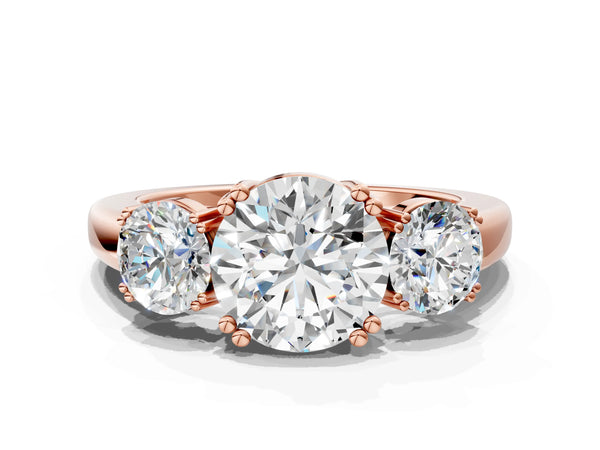Rose gold Three-Stone Round Cut Cut Diamond Ring with Channel Set Band and Four-Prong Setting