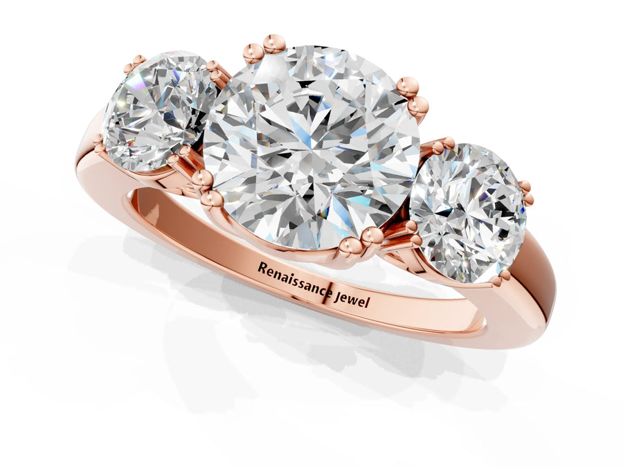Rose gold Three-Stone Round Cut Cut Diamond Ring with Channel Set Band and Four-Prong Setting