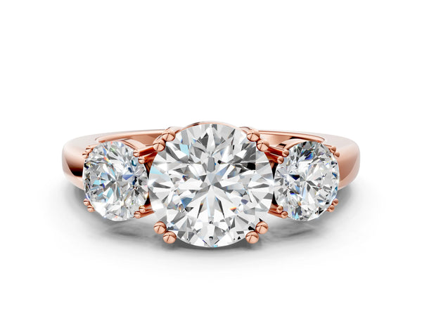 Rose gold Three-Stone Round Cut Cut Diamond Ring with Channel Set Band and Four-Prong Setting