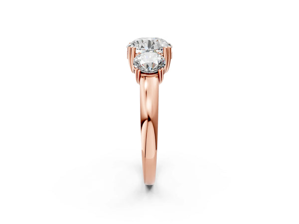 Rose gold Three-Stone Round Cut Cut Diamond Ring with Channel Set Band and Four-Prong Setting