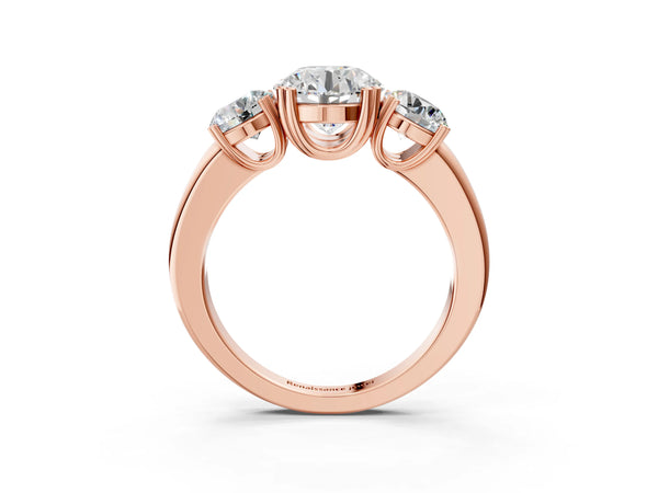 Rose gold Three-Stone Round Cut Cut Diamond Ring with Channel Set Band and Four-Prong Setting