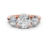 Rose gold Three-Stone Round Cut Cut Diamond Ring with Channel Set Band and Four-Prong Setting_7