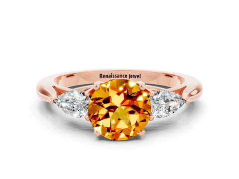 Rose gold Three-Stone Round Cut Cut Diamond Ring with Pear Side Stones in Four-Prong Setting