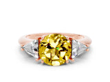 Rose gold Three-Stone Round Cut Cut Diamond Ring with Trillion Side Stones and Four-Prong Setting