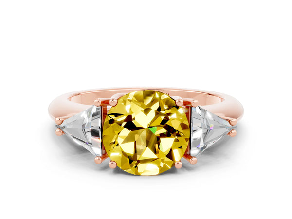 Rose gold Three-Stone Round Cut Yellow Sapphire Engagement Ring with Trillion Side Stones and Prong Setting
