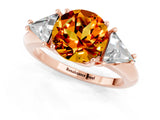 Rose gold Three-Stone Round Cut Cut Diamond Ring with Trillion Side Stones and Four-Prong Setting_1