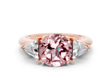Rose gold Three-Stone Round Cut Cut Diamond Ring with Trillion Side Stones and Four-Prong Setting