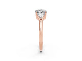 Rose gold Three-Stone Round Cut Cut Diamond Ring with Trillion Side Stones and Four-Prong Setting_2