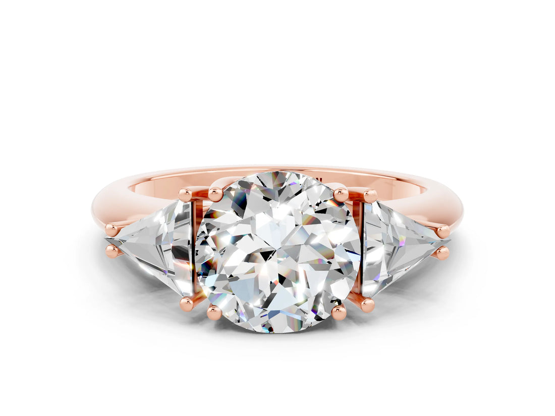 Rose gold Three-Stone Round Cut Cut Diamond Ring with Trillion Side Stones and Four-Prong Setting