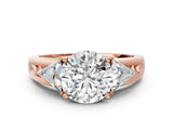 Rose gold Three-Stone Round Cut Cut Diamond Ring with Trillion Side Stones on a Split Shank Band_13