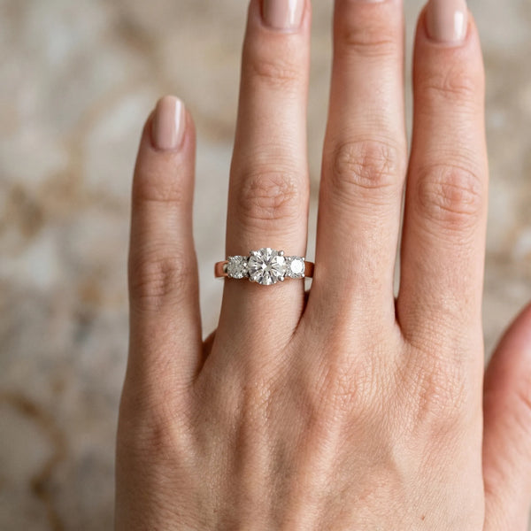 Rose gold Three-Stone Round Cut Diamond Engagement Ring with Flat Band and Four-Prong Setting
