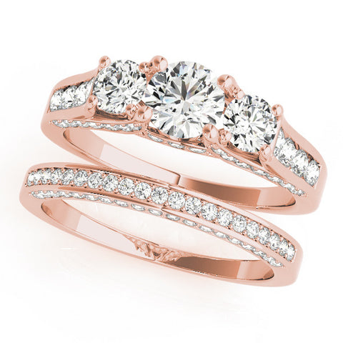 Rose gold Three-Stone Round Cut Diamond Ring with Channel-Set Band and Four-Prong Setting 1