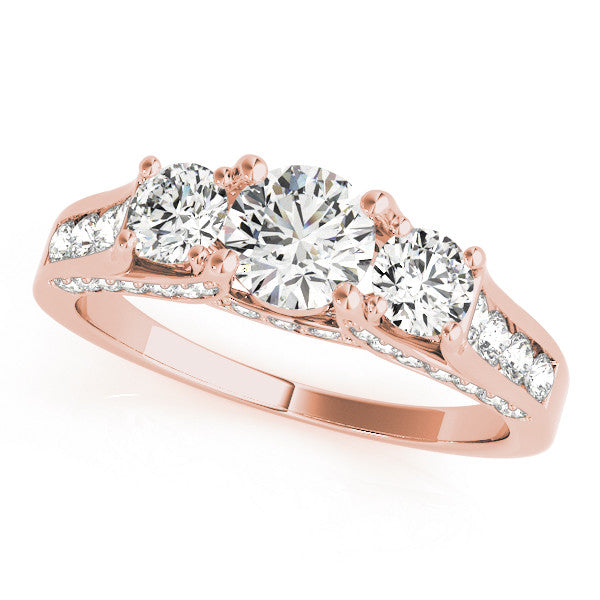 Rose gold Three-Stone Round Cut Diamond Ring with Channel-Set Band and Four-Prong Setting