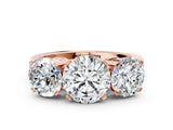 Rose gold Three-Stone Round Cut Diamond Ring with Channel Set Band and Four-Prong Setting_18