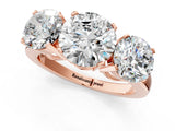 Rose gold Three-Stone Round Cut Diamond Ring with Channel Set Band and Four-Prong Setting_19