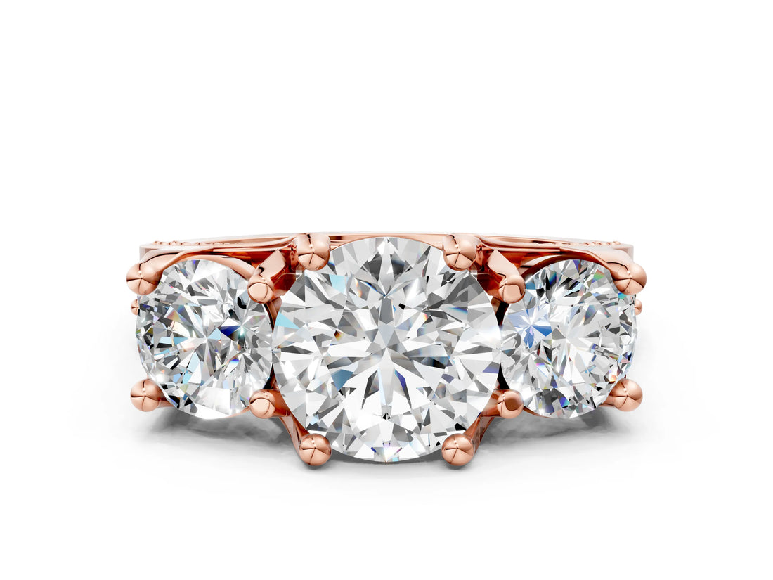 Rose gold Three-Stone Round Cut Diamond Ring with Channel-Set Band and Four-Prong Setting_69