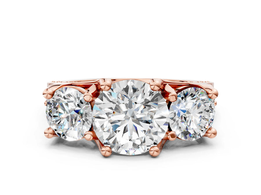 Rose gold Round Cut Diamond Three-Stone Ring with Channel Set Band and Four-Prong Setting