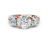 Rose gold Three-Stone Round Cut Diamond Ring with Channel-Set Band and Four-Prong Setting_78