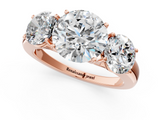 Rose gold Three-Stone Round Cut Diamond Ring with Channel-Set Band and Four-Prong Setting_79