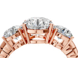 Rose gold Three-Stone Round Cut Diamond Ring with Channel-Set Band and Prong Setting_10