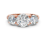 Rose gold Three-Stone Round Cut Diamond Ring with Channel-Set Band and Prong Setting_6